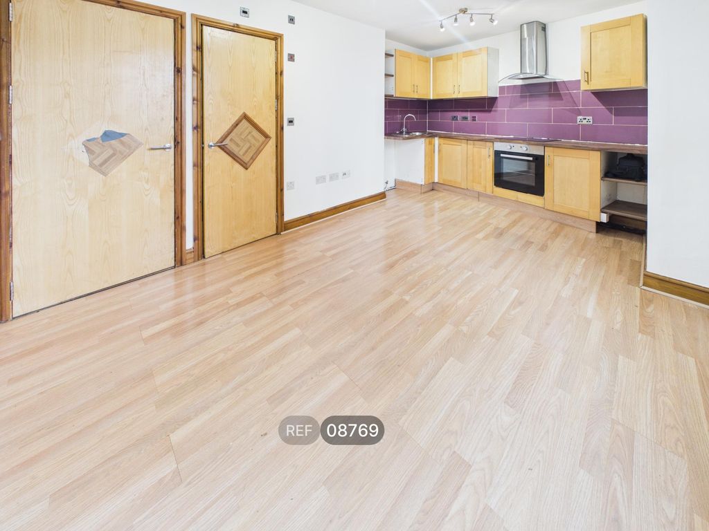 Property photo 2 of 4 Kitchen/Living Area