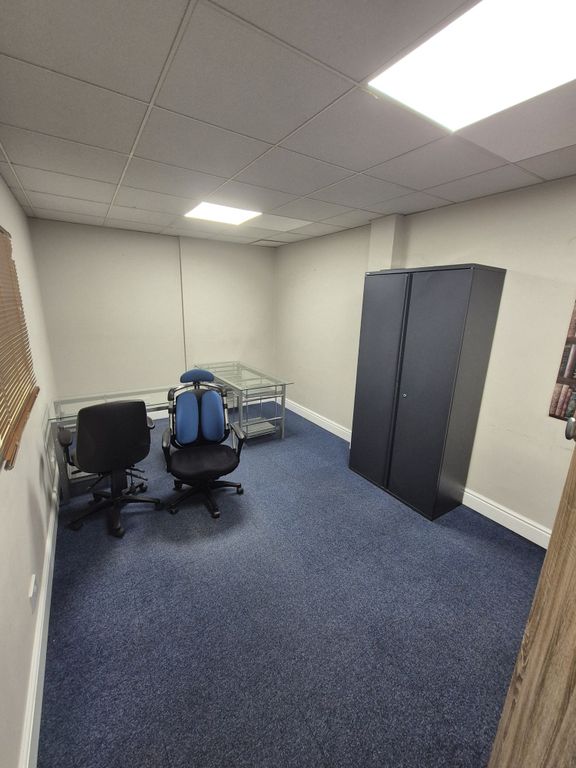 Property photo 2 of 4 Simple, Well-Kept Workspace With Carpeted Floors, ...