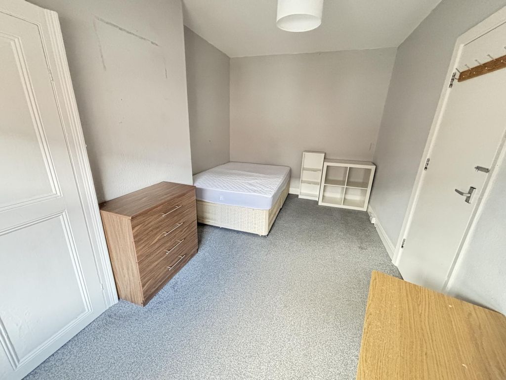 Property photo 3 of 12 A Simple, Tidy Bedroom With A Single Bed, A Bedsid...
