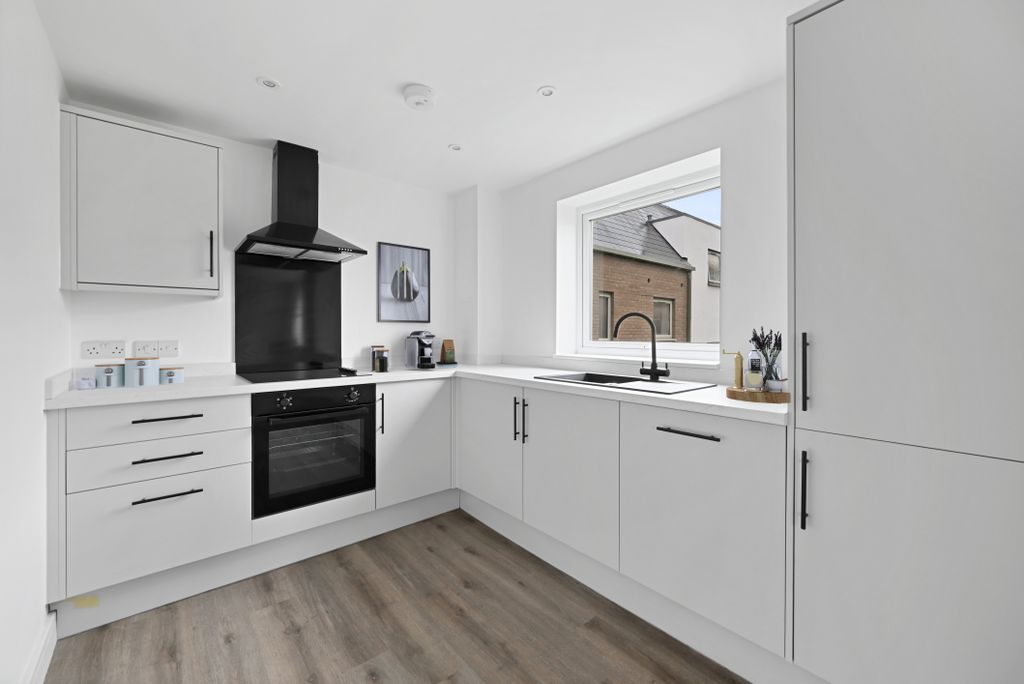 Property photo 3 of 8 Front