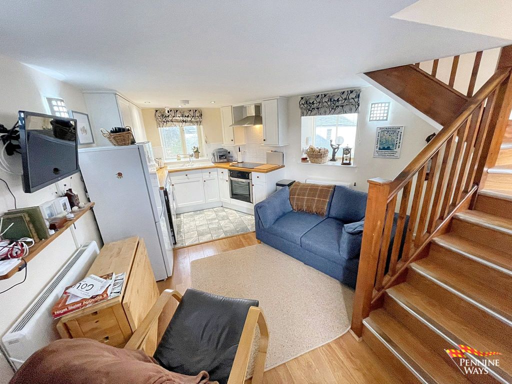 Property photo 3 of 6 Living Area