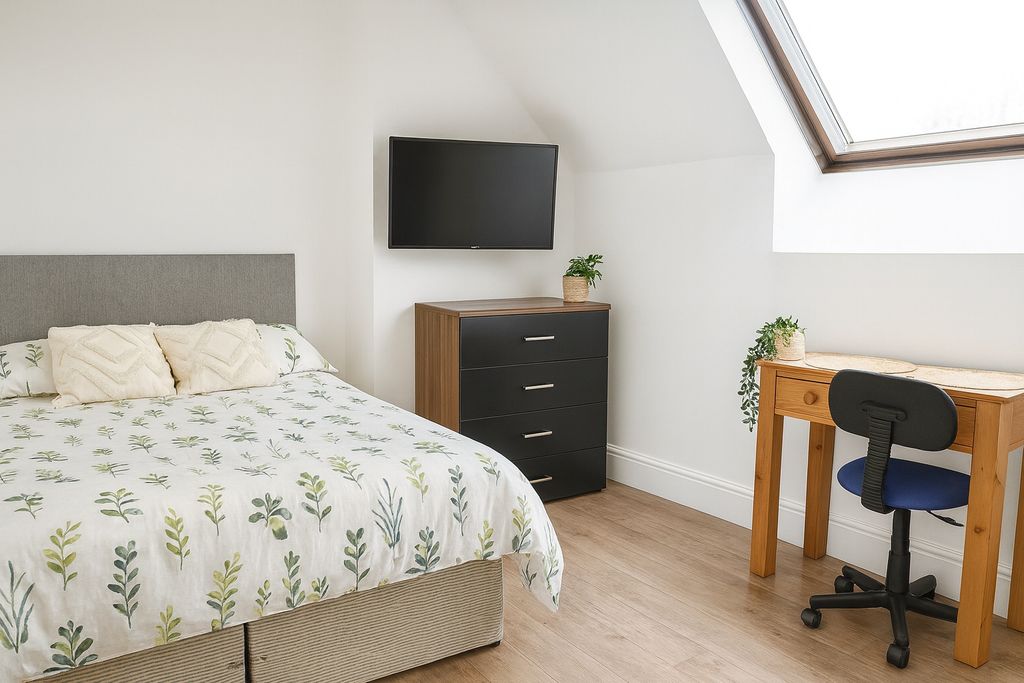 Property photo 3 of 12 Bright And Inviting Master Bedroom Featuring A Com...