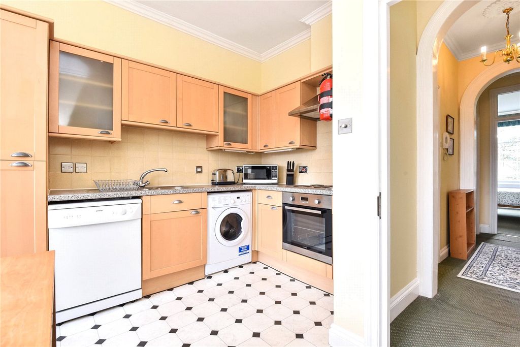 Property photo 3 of 8 Kitchen