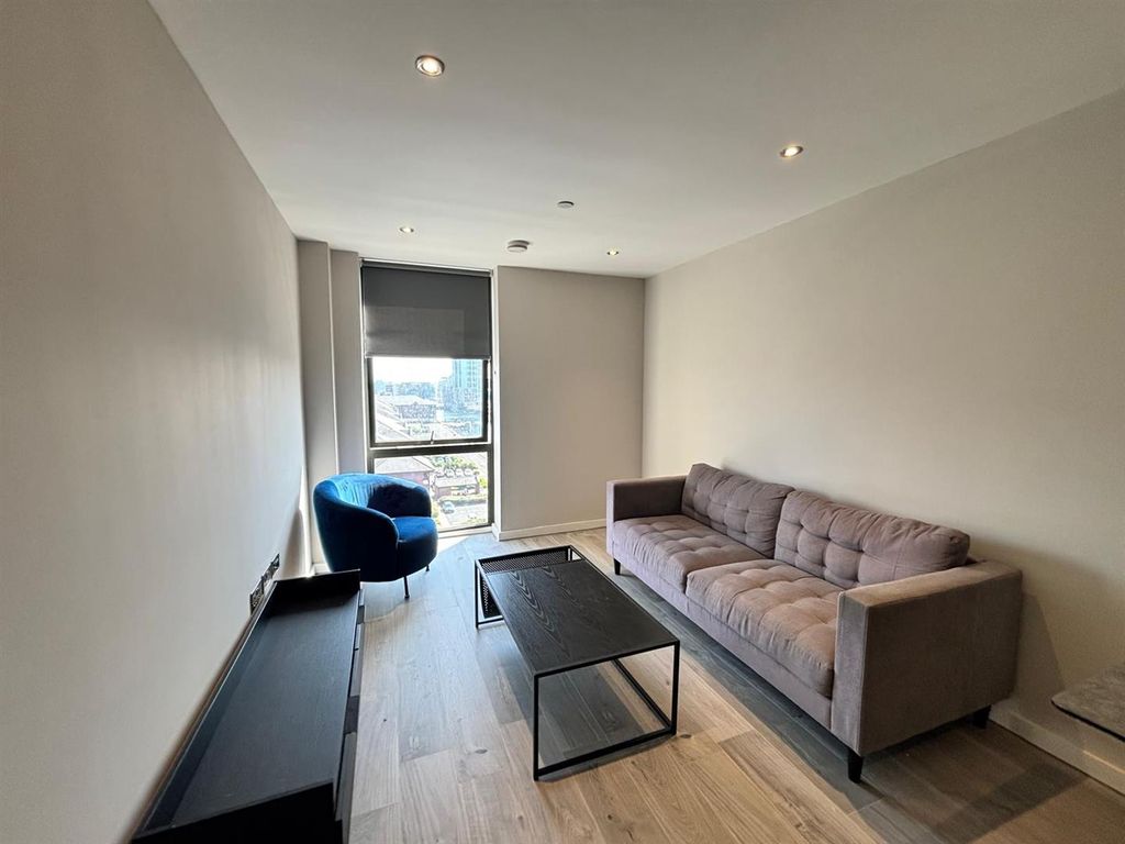 Property photo 1 of 9 702 - Living Room.Png