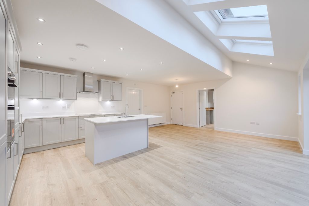 Property photo 3 of 16 Kitchen/Dining/Family Area