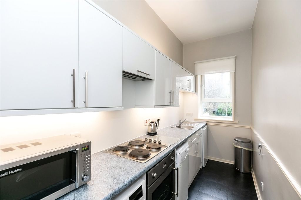Property photo 3 of 6 Kitchen