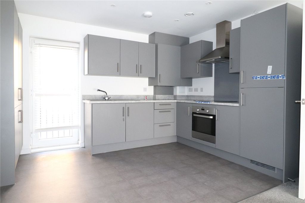 Property photo 2 of 8 Kitchen Area