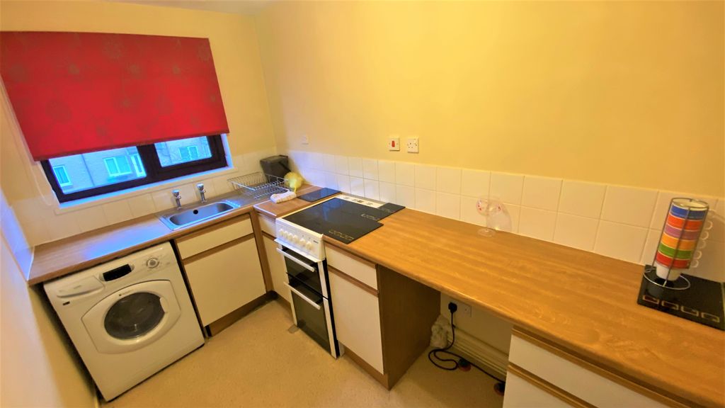 Property photo 3 of 7 Kitchen