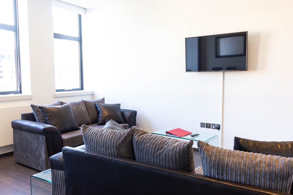 Property photo 2 of 9 A Spacious And Stylish Modern Living Room With Amp...