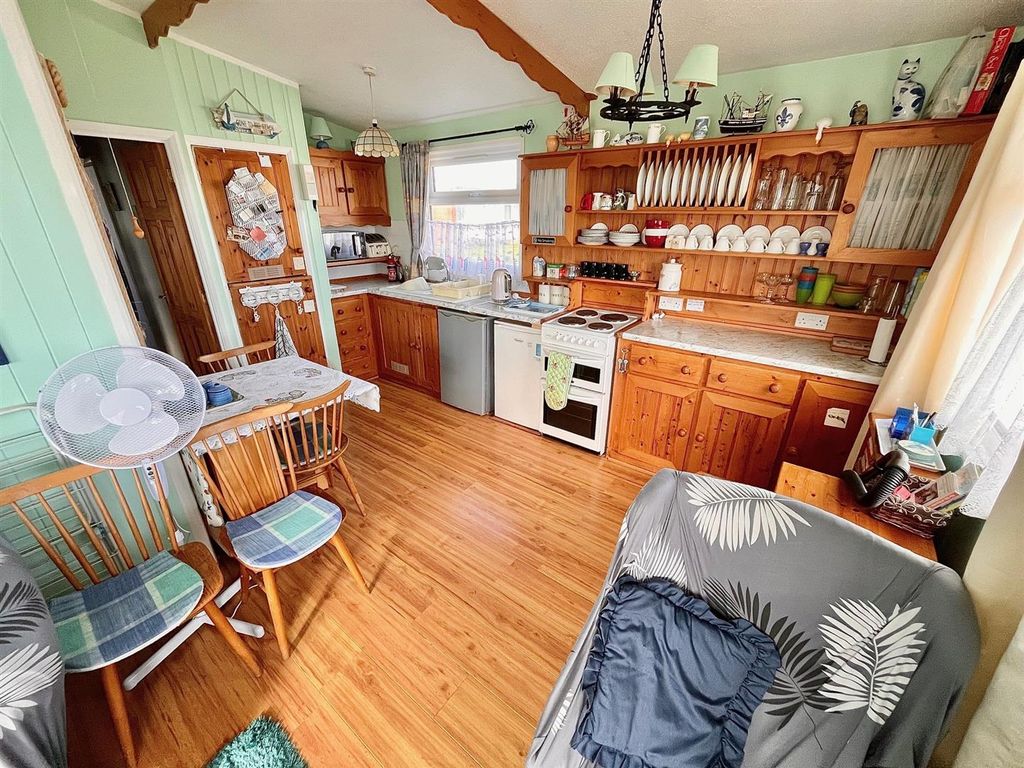 Property photo 3 of 13 Kitchen Area