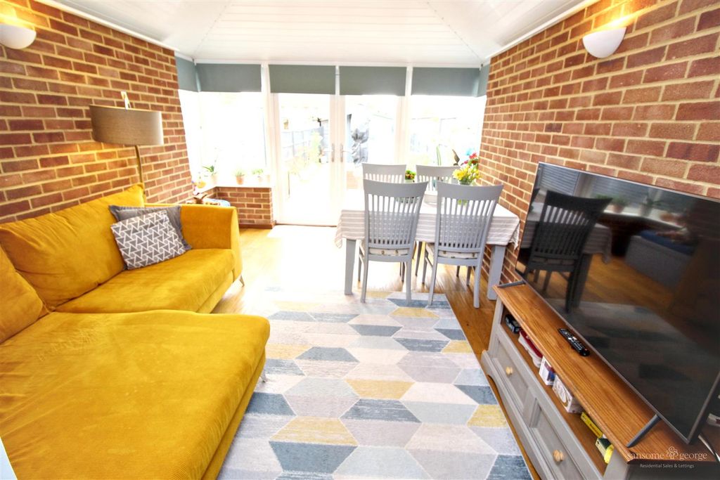 Property photo 3 of 18 Family Room