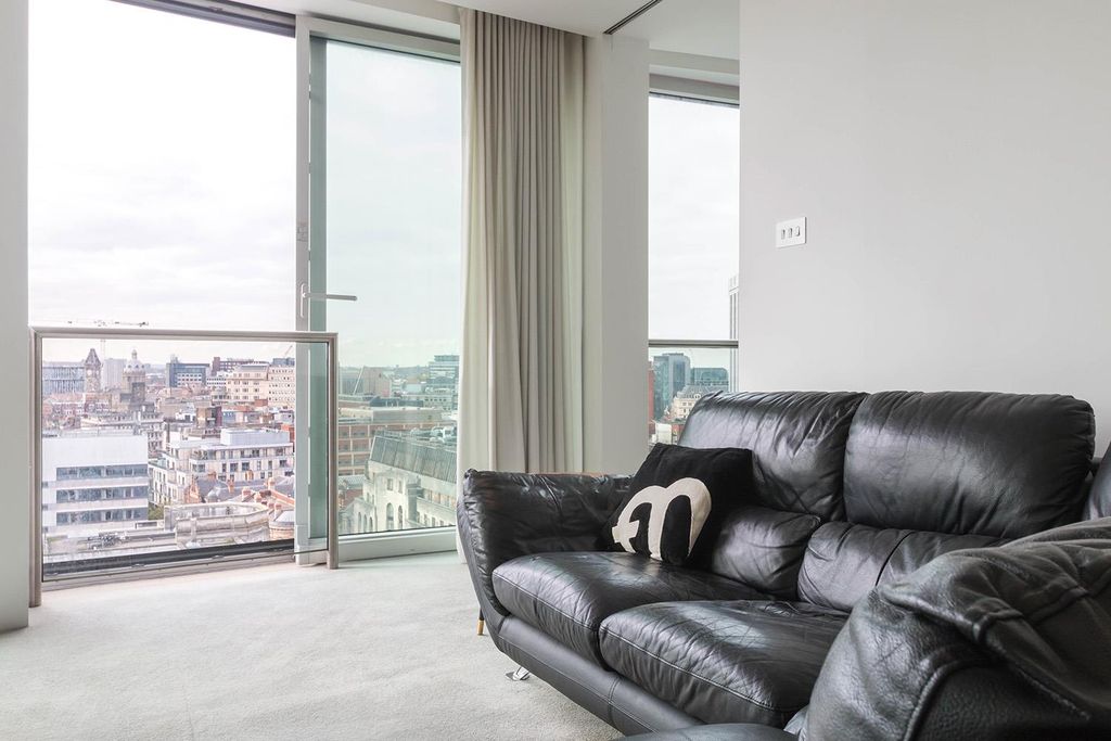 Property photo 2 of 12 Living Area