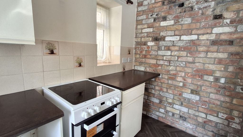 Property photo 2 of 12 Kitchen