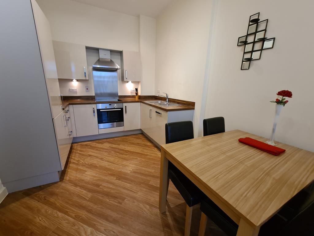 Property photo 3 of 12 Dining/Kitchen