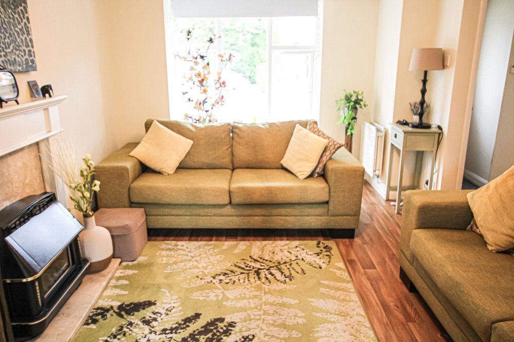 Property photo 3 of 12 Living Area