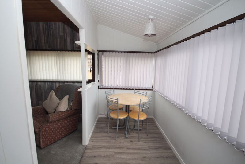 Property photo 2 of 11 Entry Dining Area