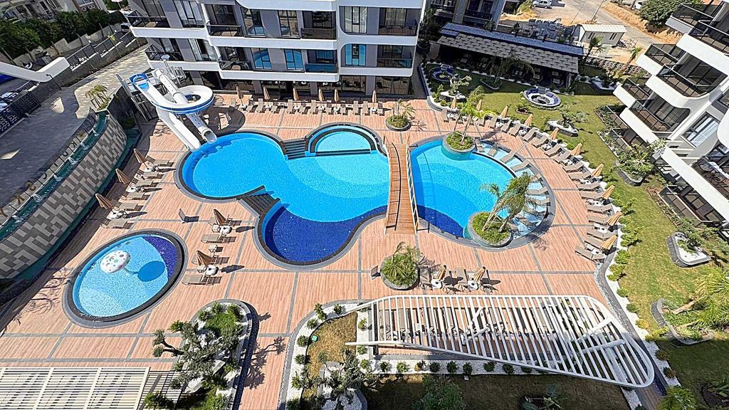 Property photo 3 of 25 Indulgent One Bedroom Apartment For Sale In Alanya Â€“ Communal Swimming Pools And Terraces