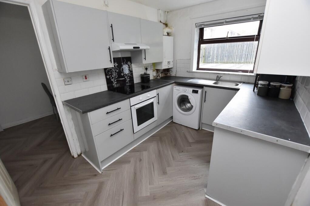 Property photo 3 of 13 Kitchen