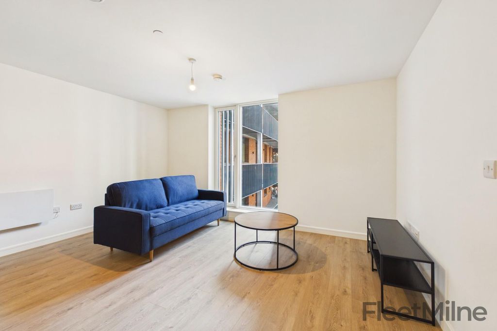 Property photo 1 of 12 Living Area