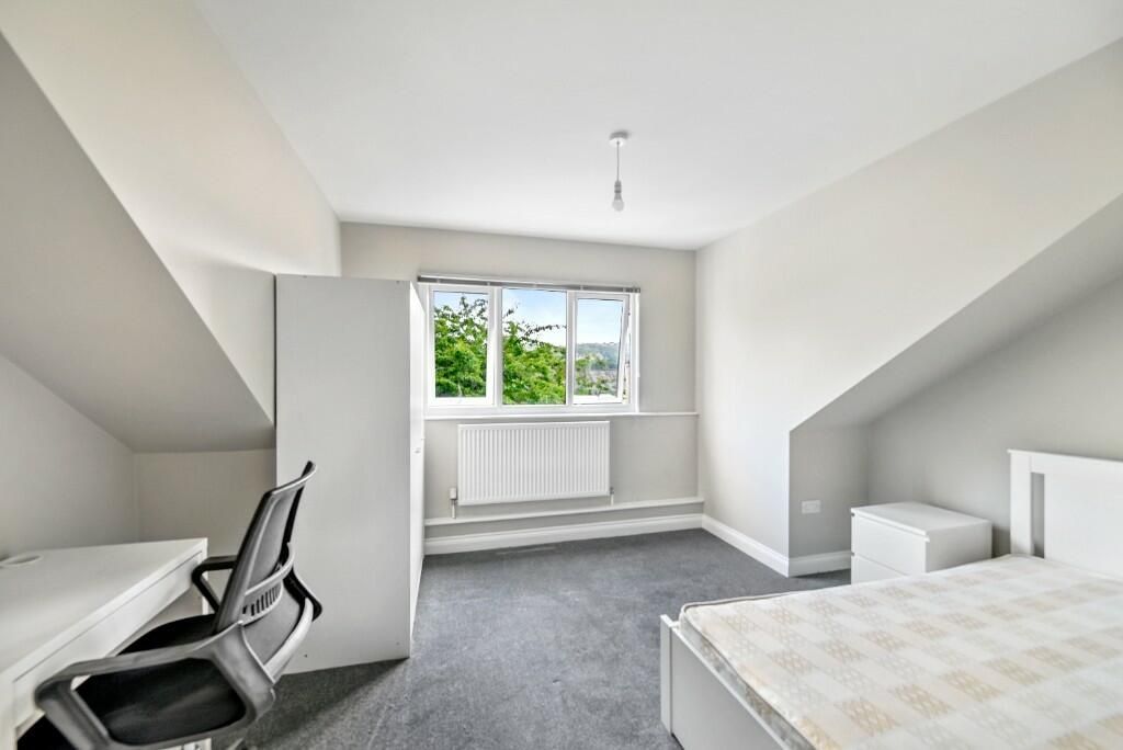 Property photo 1 of 15 Bright And Spacious Master Bedroom Featuring A Com...