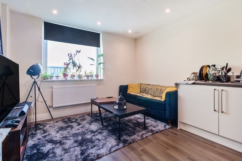 Property photo 1 of 9 Living Area