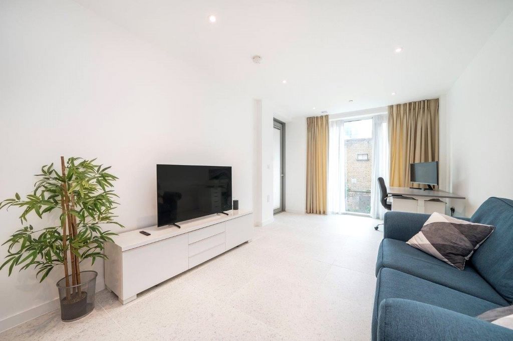 Property photo 3 of 15 Living Area