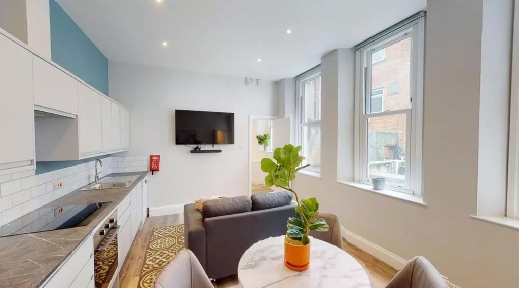 Property photo 1 of 9 A Spacious And Stylish Modern Living Room Filled W...