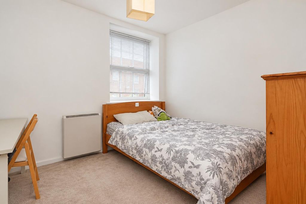 Property photo 3 of 9 Minimalist Bedroom With Plush Toys.Png