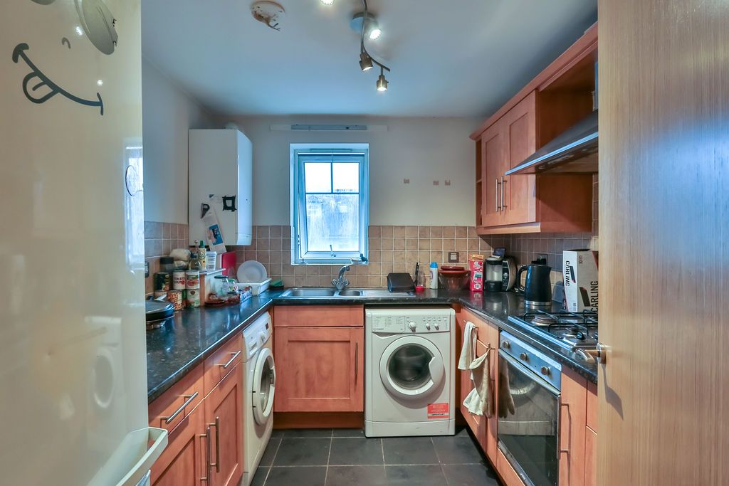 Property photo 3 of 12 Kitchen
