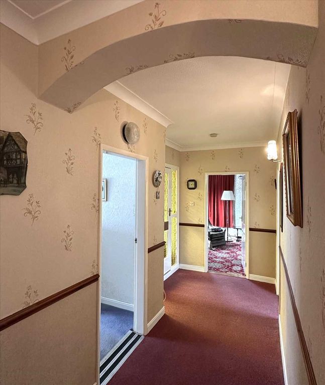Property photo 3 of 16 L-Shaped Hallway: