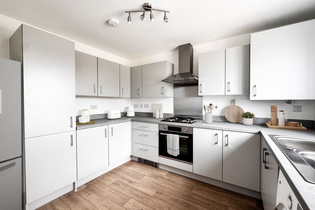Property photo 3 of 11 Dd - Kitchen