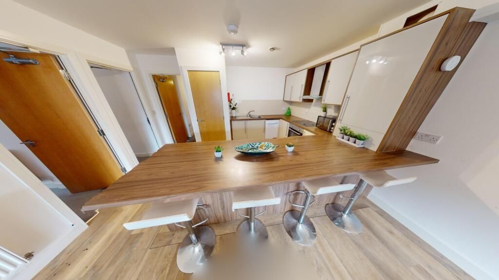 Property photo 3 of 13 A Modern, Well-Maintained Kitchen Featuring A Spac...