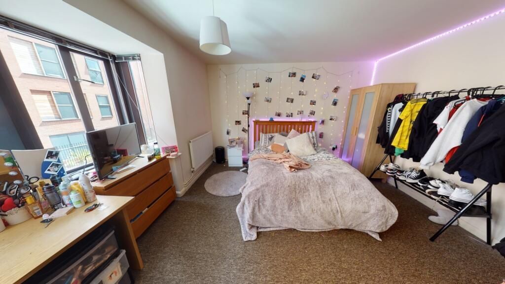 Property photo 1 of 5 Bright And Spacious Master Bedroom Featuring A Com...