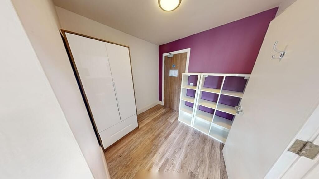 Property photo 2 of 3 This Cozy Double Bedroom Features A Vibrant Accent...
