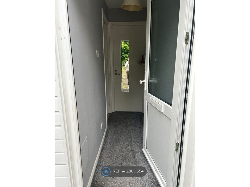 Property photo 3 of 15 Front Door And Down Stairs Storage