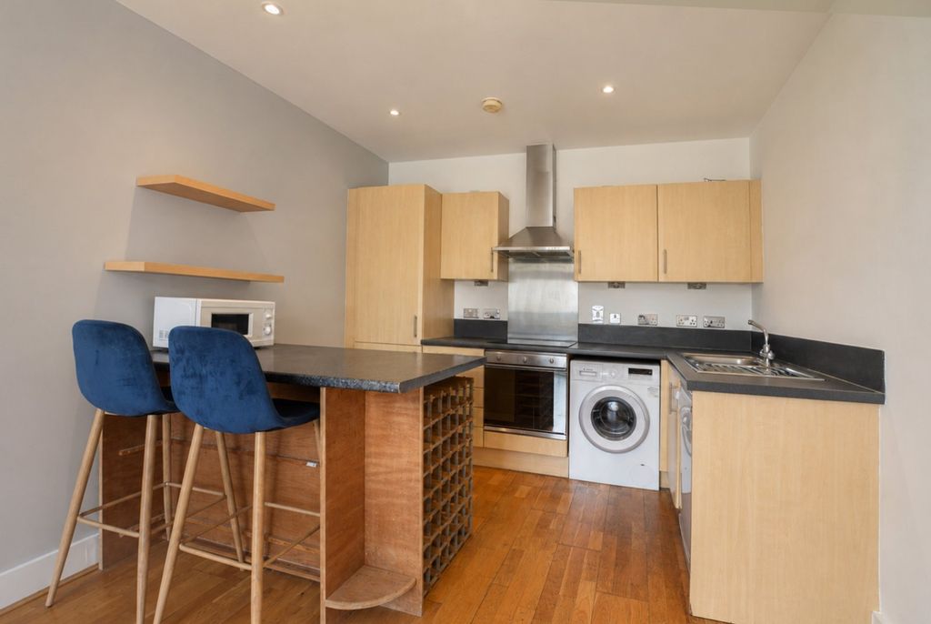 Property photo 2 of 11 Kitchen