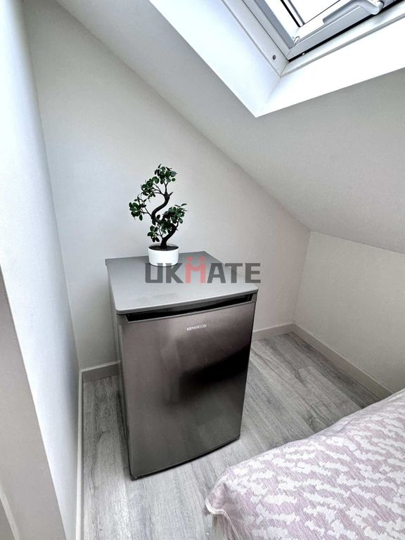 Property photo 3 of 5 A Bright And Modern Kitchen Area Featuring A Compa...