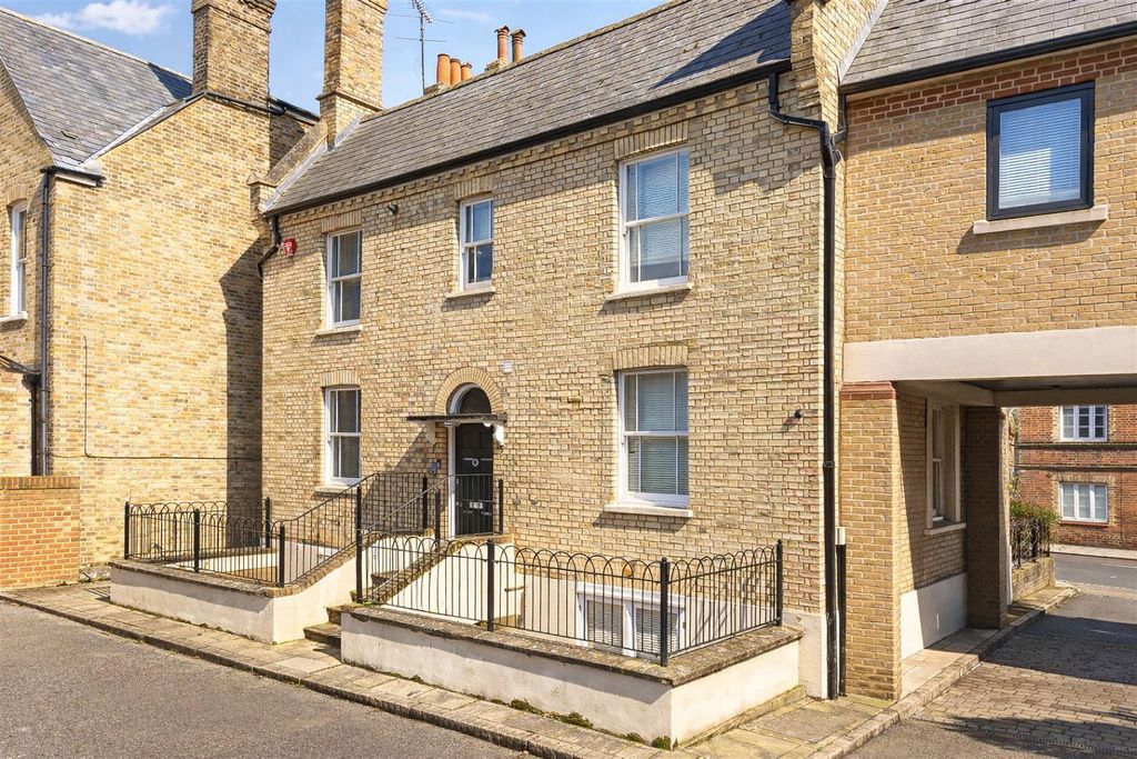 Property photo 1 of 20 Traditional Two-Story Brick House In Sunlight (1).