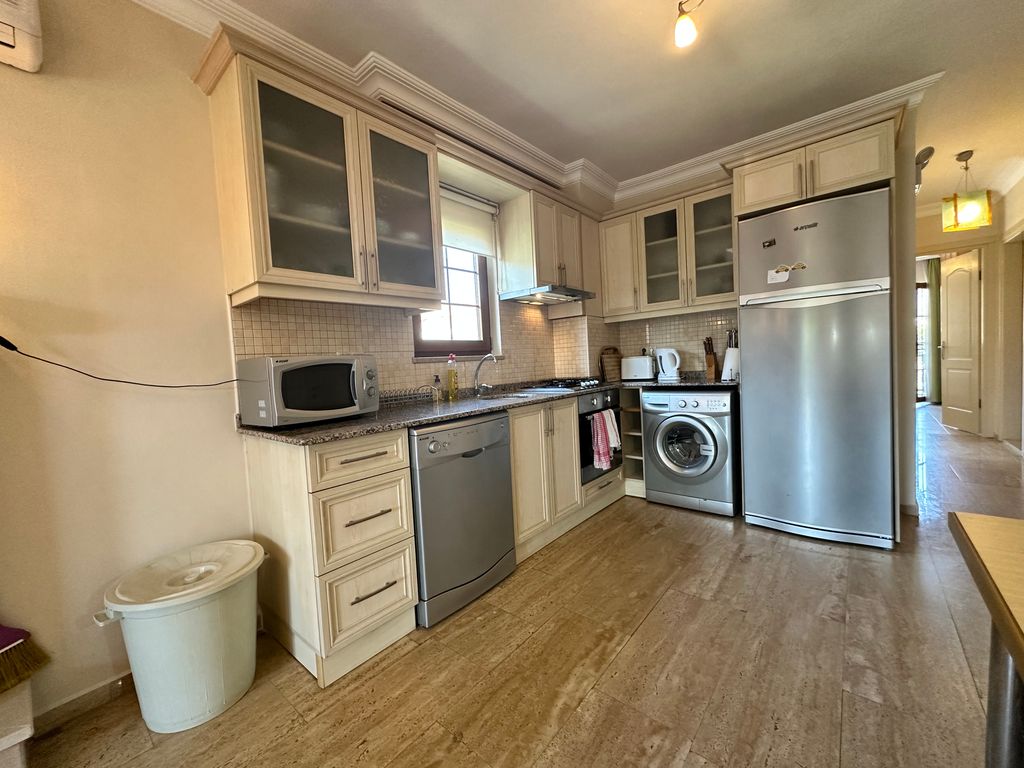 Property photo 3 of 18 A Delightful First-Floor Apartment In Dalyan For Sale - Fully Fitted Kitchen With Appliances