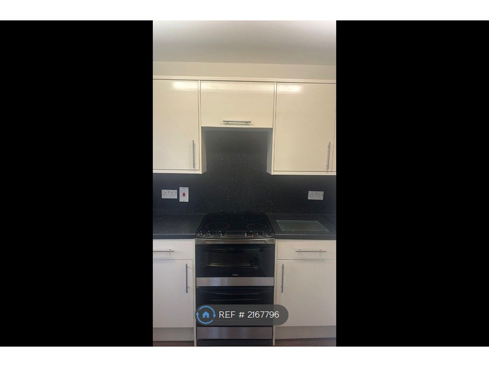 Property photo 2 of 10 Kitchen Front View