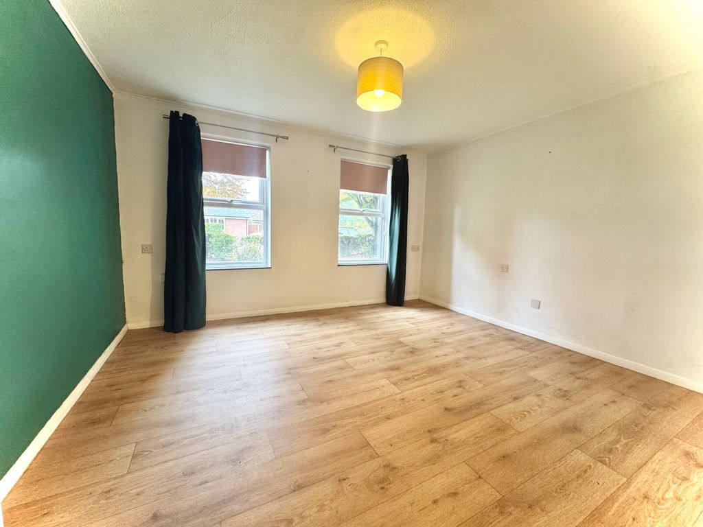 Property photo 3 of 7 Living Area