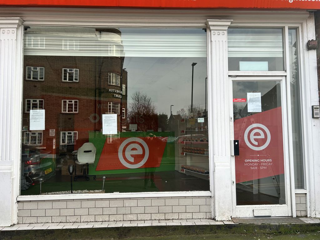 Property photo 2 of 8 Front 3