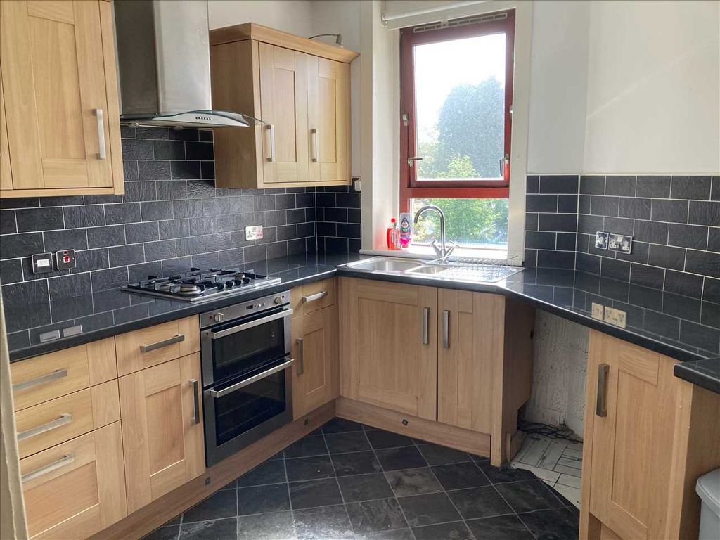 Property photo 3 of 7 Kitchen