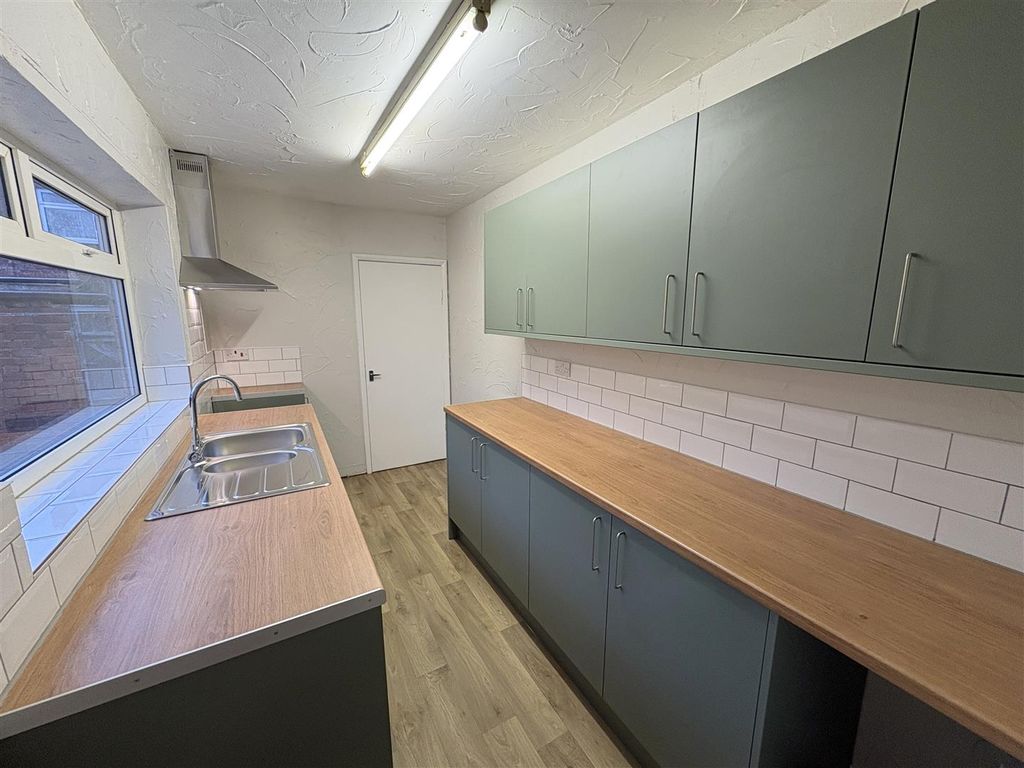 Property photo 1 of 12 Kitchen