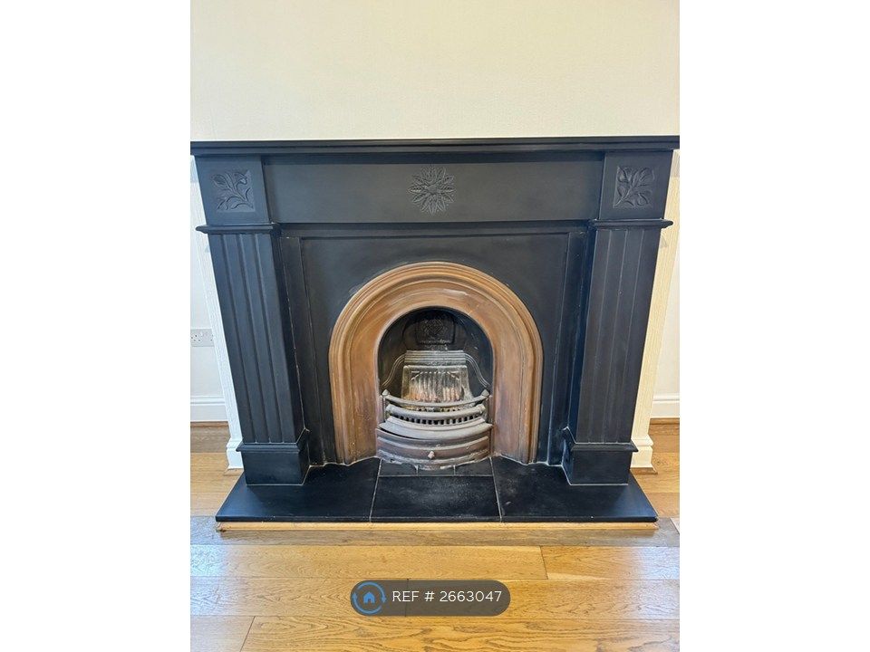 Property photo 3 of 18 Fireplace