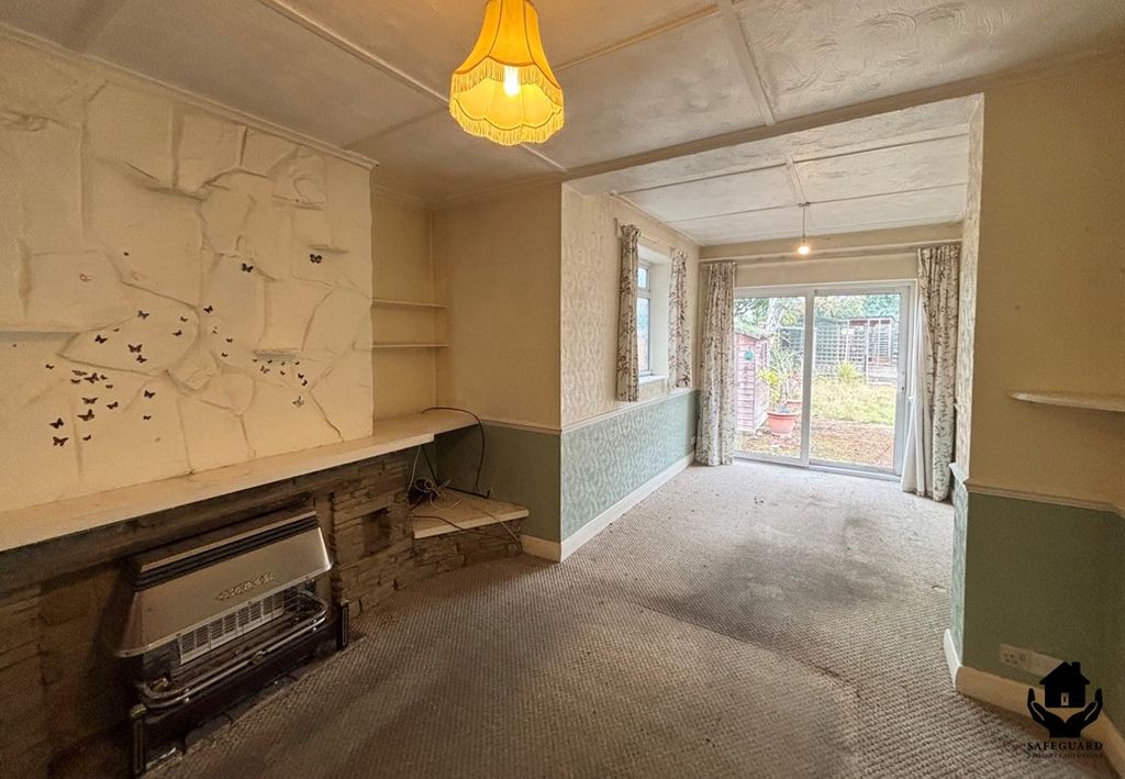 Property photo 3 of 14 Family Room - Dining Area