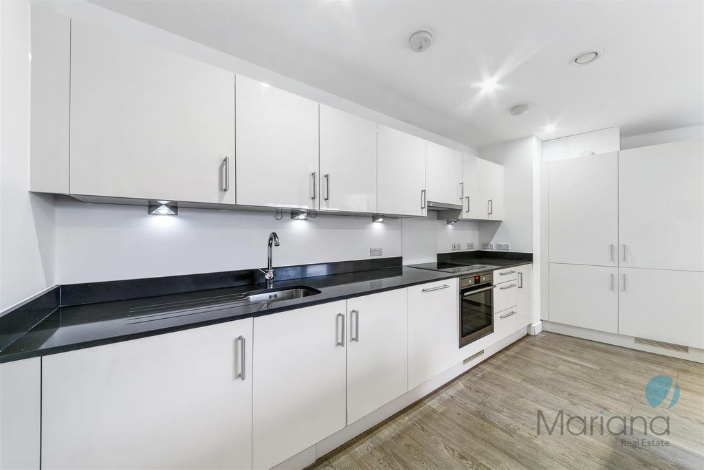 Property photo 3 of 12 Kitchen