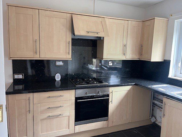 Property photo 3 of 7 Kitchen