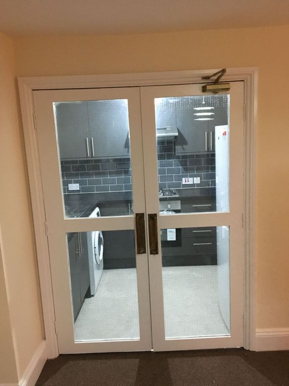 Property photo 2 of 14 Modern Galley-Style Kitchen Viewed Through Glazed ...