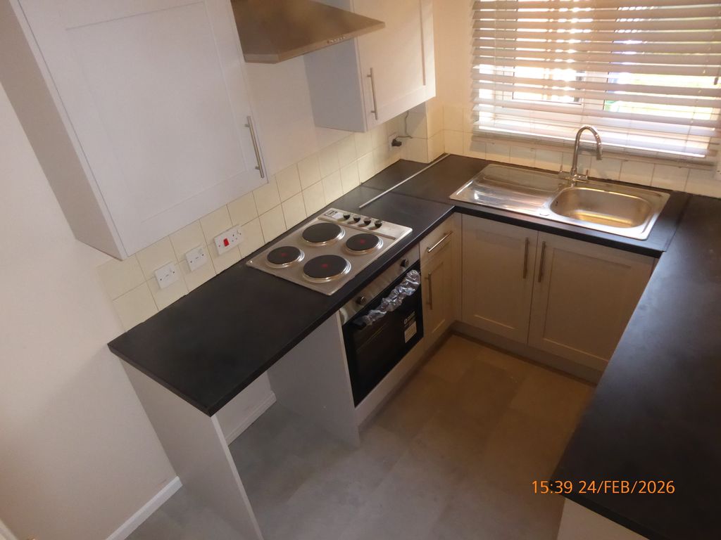 Property photo 2 of 6 Kitchen Area